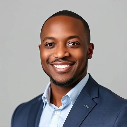 John Otim, Head of Operations, looking confident and professional